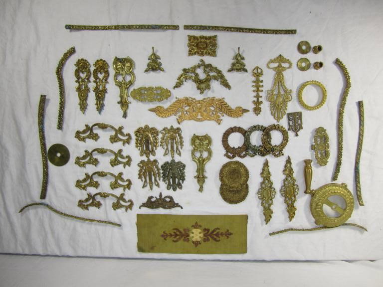 Large Group of Bronze and Brass Mounts: escutcheons, bead lines, etc. A few ormolu.