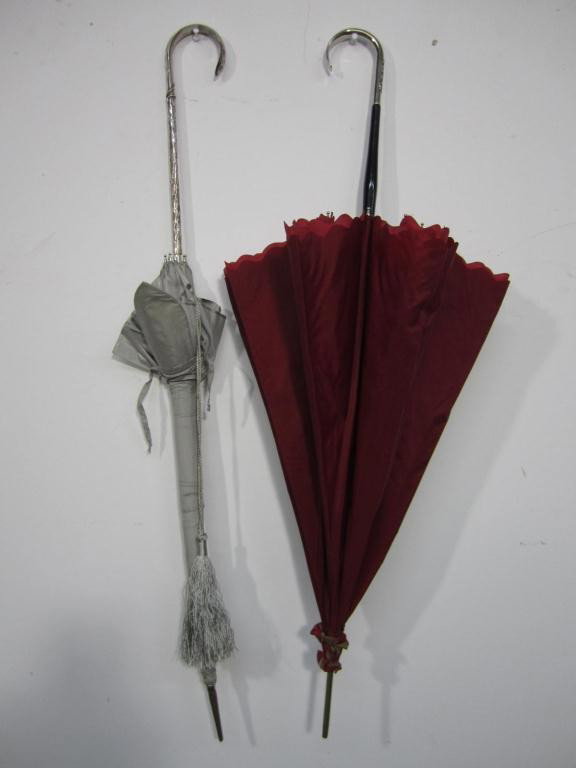 Continental Silver Handle Umbrella together with: a silver plated handle umbrella - Continental silver marked 800 with modern grey cloth