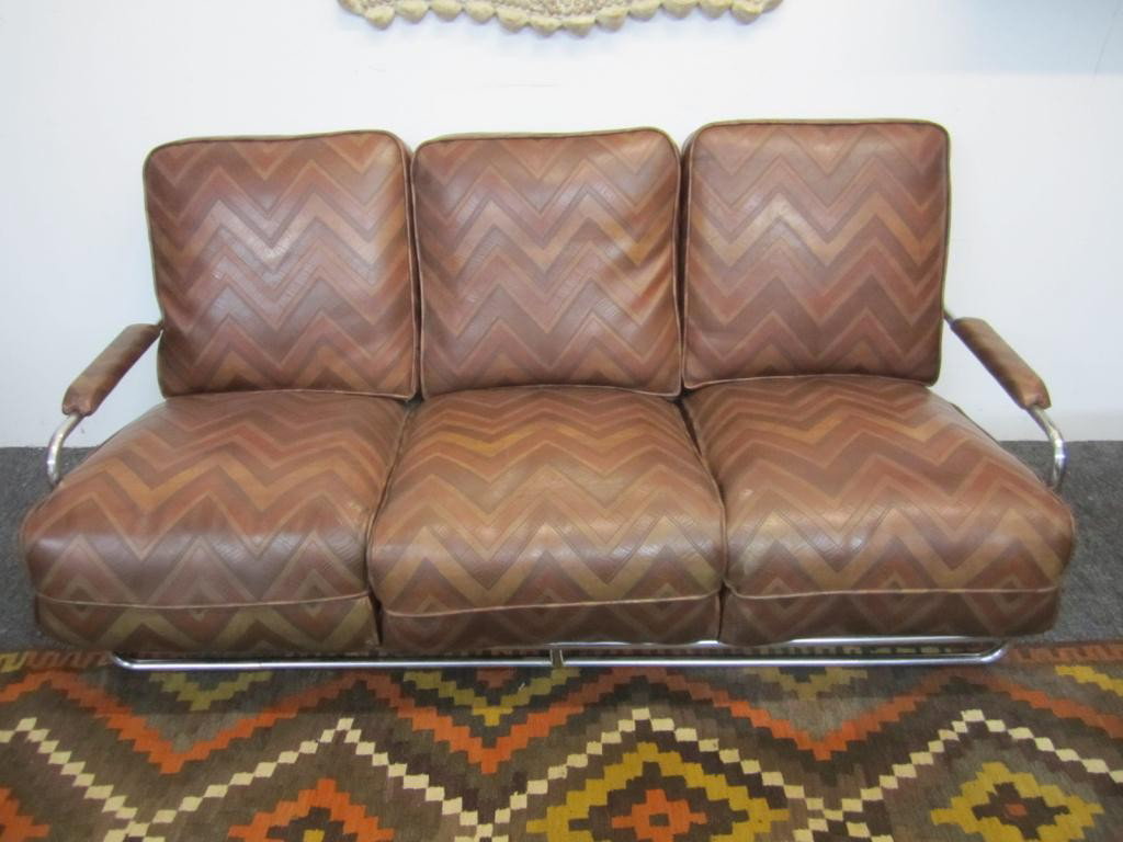 Mid-Century Chrome Framed Triple Cushion Sofa: "Flame Stitch" 3 tone leather pattern. Upholstered front and back of cushions with arm rest as well. Tubular chrome frame having center front support. 69W X 36 X 36.