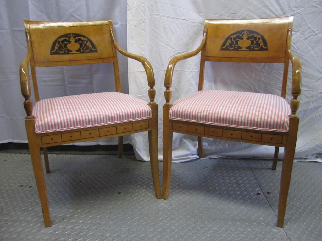 Pair Antique Swedish Beidermeier Arm Chairs: Carved fruitwood with inlaid ebony back and details. Arms restored. Upholstered seats. 21 wide X 23 deep X 33 tall.