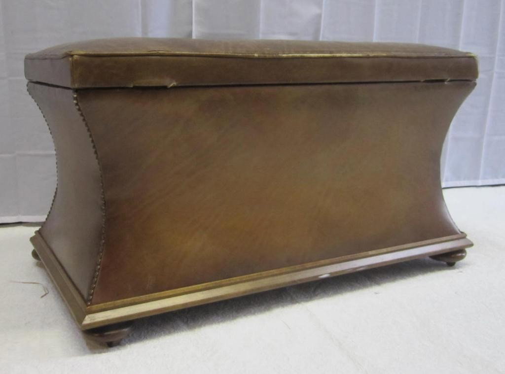 Tapered Shape Leather Blanket Chest: Tapered Shape Leather Blanket Chest distressed leather with hinged top and bun feet, studded sides. 34 X 20 X 19 tall.