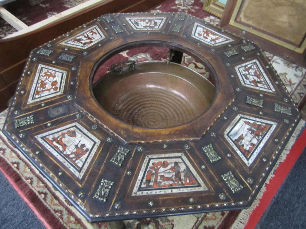 Renaissance Style Brazier / Cocktail Table: The middle brass tray suspended from the main body, or fitted into the top, being inlaid of bone and tortoiseshell in various figural scenes. Turned legs with one mount missing. Complimented with asso
