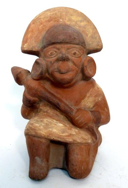 South American Terra Cotta Figural Vessel: Figure kneeling and holding scepter. 9 3/4"H x 6 1/2"W x 7 1/2" D