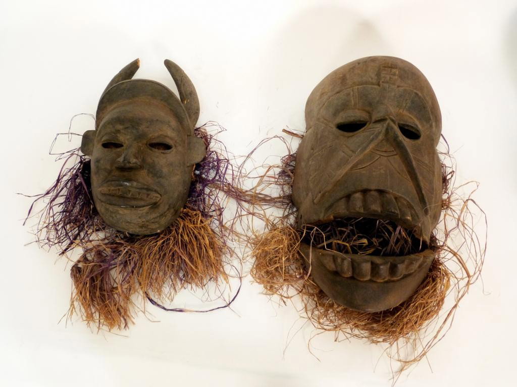2 Wood and Straw African Facial Masks: ceremonial.