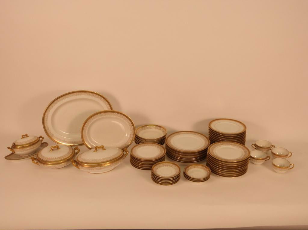 56 Piece L. Bernardaud & Co. Partial Dinner Set: Partial dinner set designed for Limoges. Including 5 large serving pieces. Gilt rimmed.