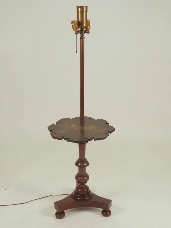 Regency Style Stick Lamp Table: with a Japanned" or Chinoiserie decorated and wonderfully shaped offset table top. 52 tall X 16" diameter table top. 425 East 58 Street Estate"