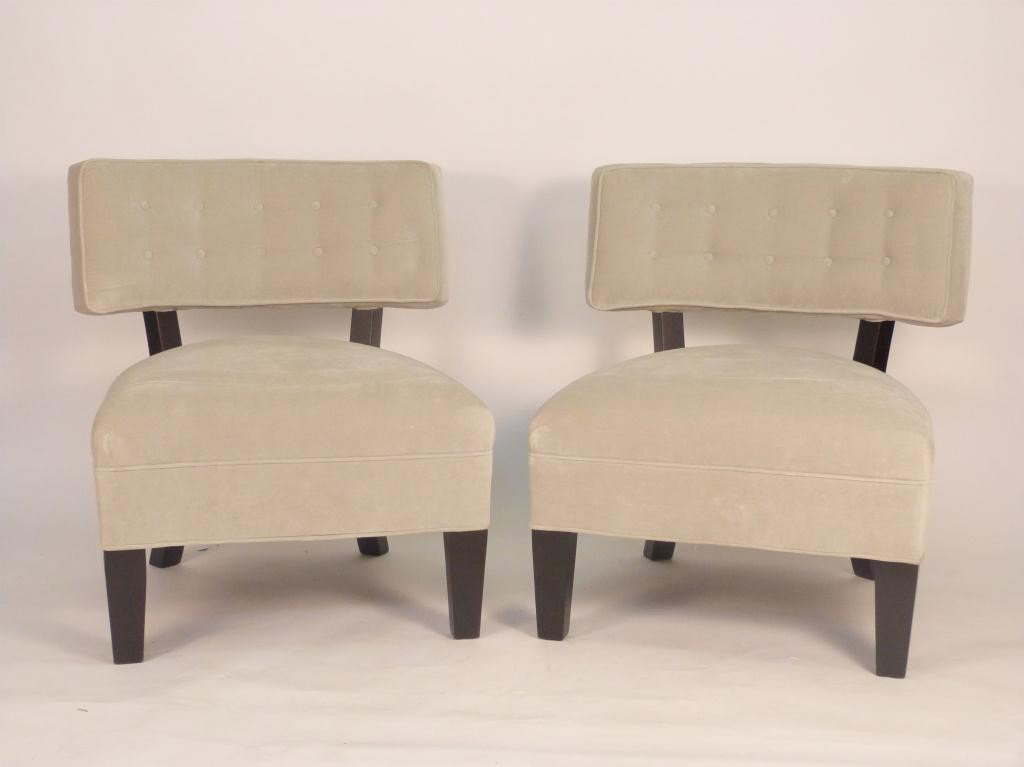 Pair Mitchell Gold Upholstered Chairs: Oversize low seats with ebonized frames and button tufted backs. Very good condition. 32D X 30W X 33 tall. Estate of Stephanie Queller