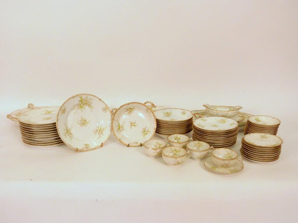 58 Piece Limoges Dinner Service: Incomplete cups, saucers, plates and serving ware.