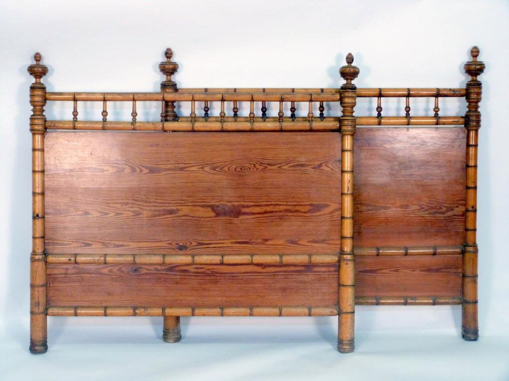Antique English Faux Bamboo Bed (with rails): Urn Finials and turned spindles all around. Spindles gallery rails included. Fair to good condition, showing age. Estate of Stephanie Queller