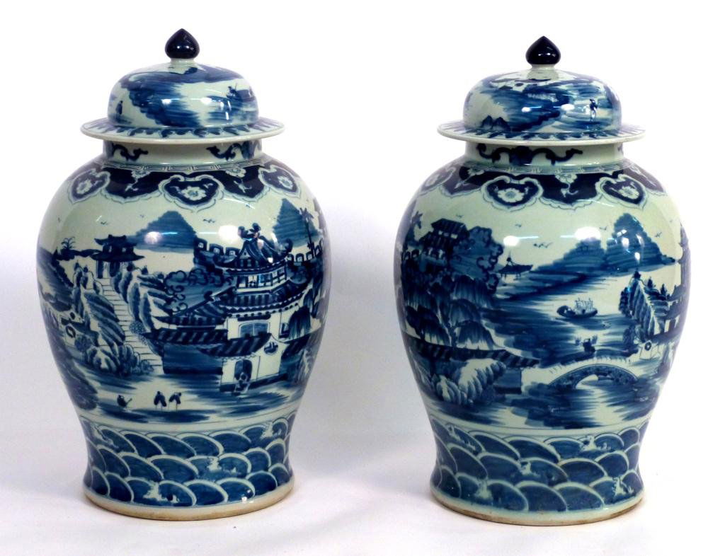 Pair Chinese Covered Ginger Jars: In blue and white Canton manner with landscape and seascape scenic designs.