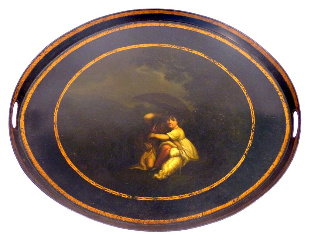 Antique English Oval Tole Tray: Oval tray with 2 open handles. Center painted with a scene of a girl and a lad and a small dog under an umbrella, in a dark landscape. Very detailed and well done.