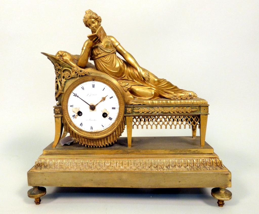 Antique French Ormolu Bronze Mantle Clock: Neo-Classical Reclining female on divan, reading a book. Enamel dial needing restoration, signed J Jennart, a Bruxelles. 13 1/2 L x 51/2" Depth, 14" H"
