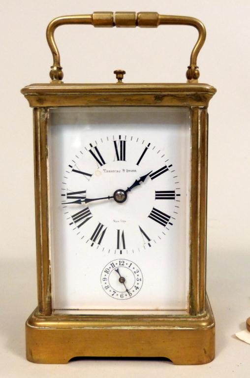 Theodore B. Starr Brass Carriage Clock: Theodore B Starr, New York. Beveled glass case, with key. 3 1/2 square X 5" T"