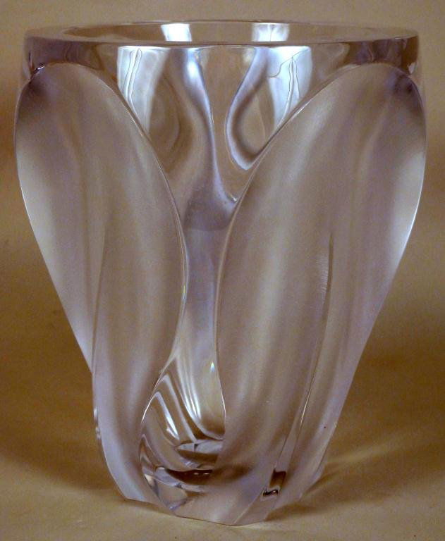 Lalique Ingrid" Vase": Tapered molded and frosted glass vase. Minor scratching on the base. 10 1/4 H"
