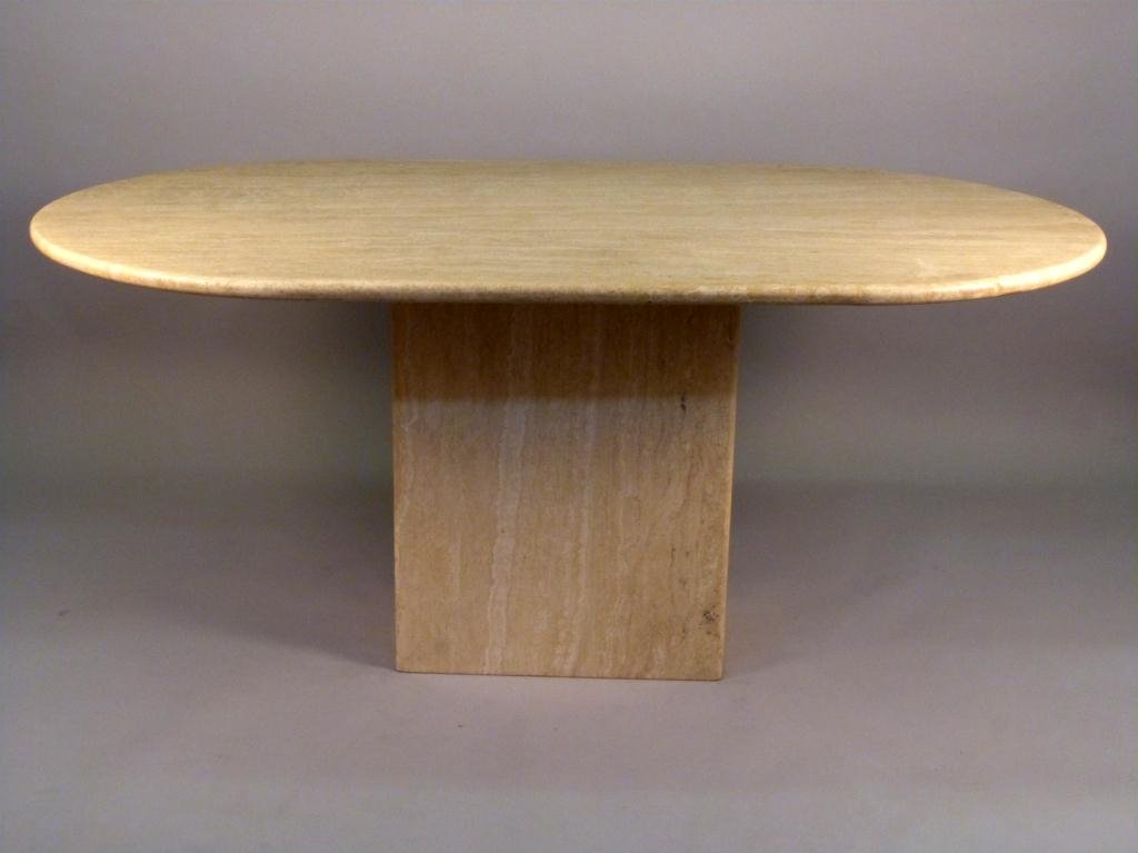 Modern Travertine Marble Dining Room Table: Oval Formed top on matching rectangular base. 67 1/2L x 39"W x 291/2"H"