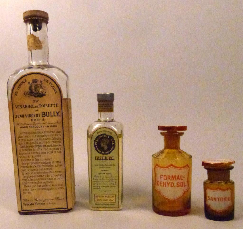 4 Vintage French Glass Apothecary Bottles: Including Jean Vincent Bully, Paris.