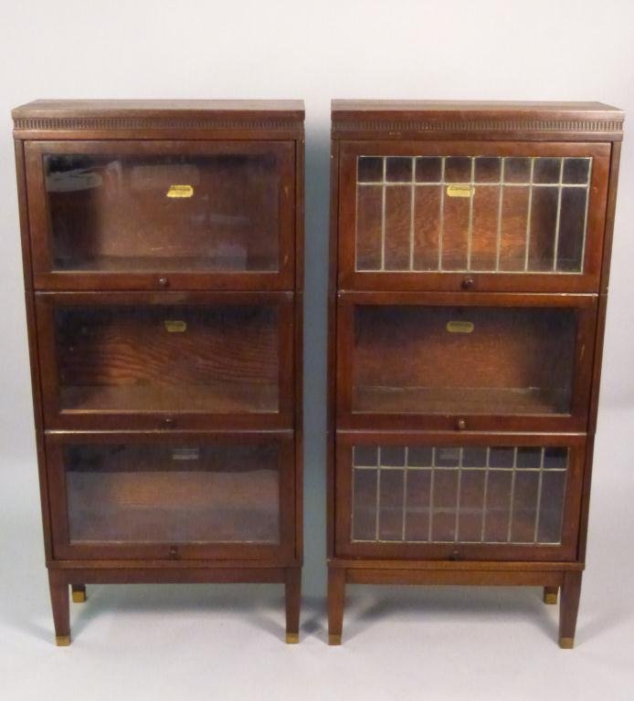 2 Lawyer's Sectional Bookcases: One with Leaded Glass. Manufactured by Lundstron. 25 1/2L x 11"W x 53"H"
