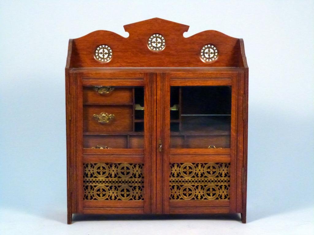 Victorian Oak Wall Cabinet: 2 doors with glazed and brass grille panels, interior drawers. 22L x 7"D x 25"H"