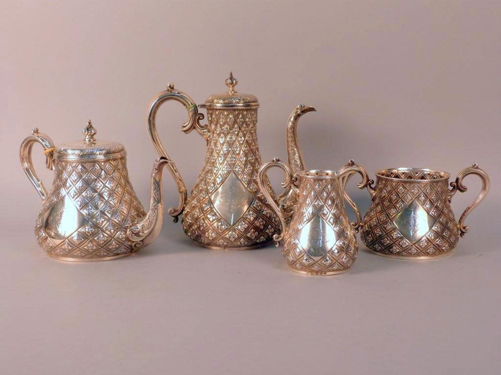 Fine English Silver Coffee & Tea Set: All over diamond pattern with open engraved panels. Sheffield 1889 Possibly White, Henderson & Co. - 77.4 troy oz.