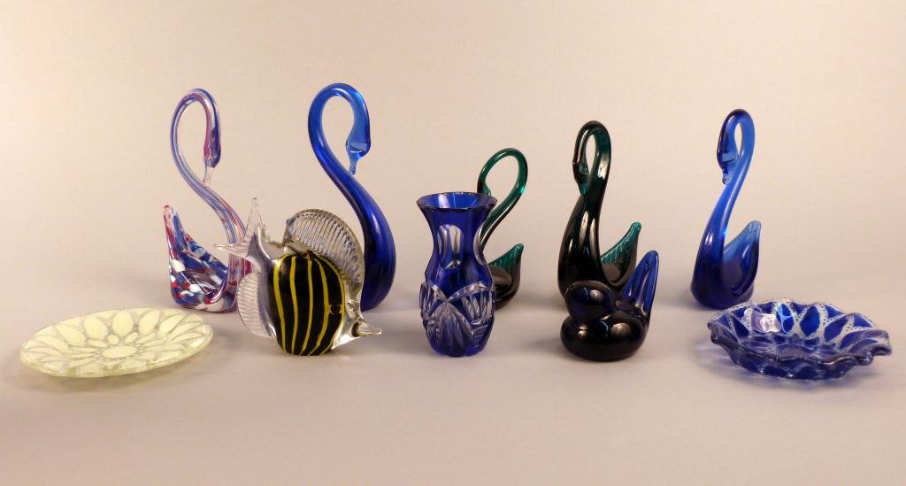 10 Pieces Art Glass Objects: Including 5 Art Glass Swans, a Small Bird, a Fish, a Bud Vase, and Two Small Dishes.