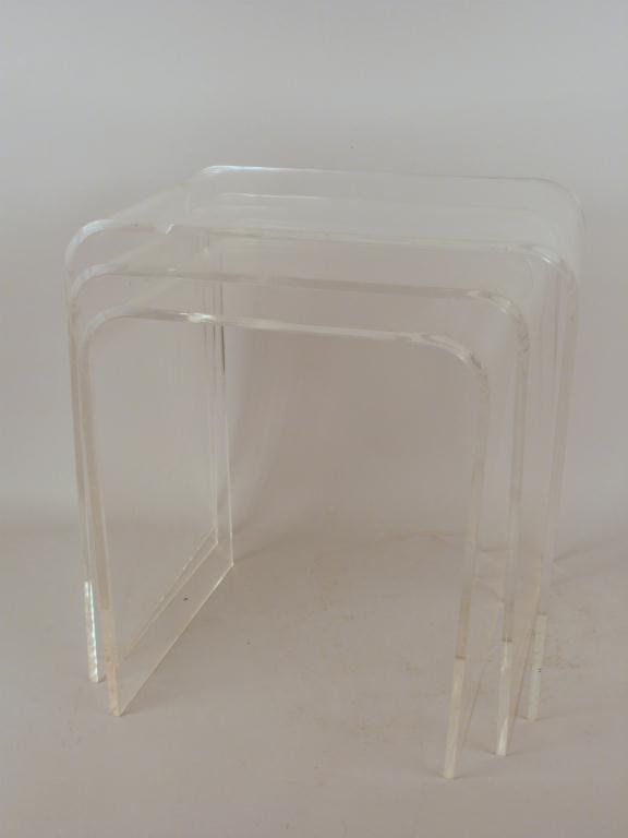 Modern Lucite Nesting Tables: 17W x 12"D x 17"H, 15"W x 12"D x 16 1/4"H, 13"W x 12"D x 15 1/4"H. In good condition."