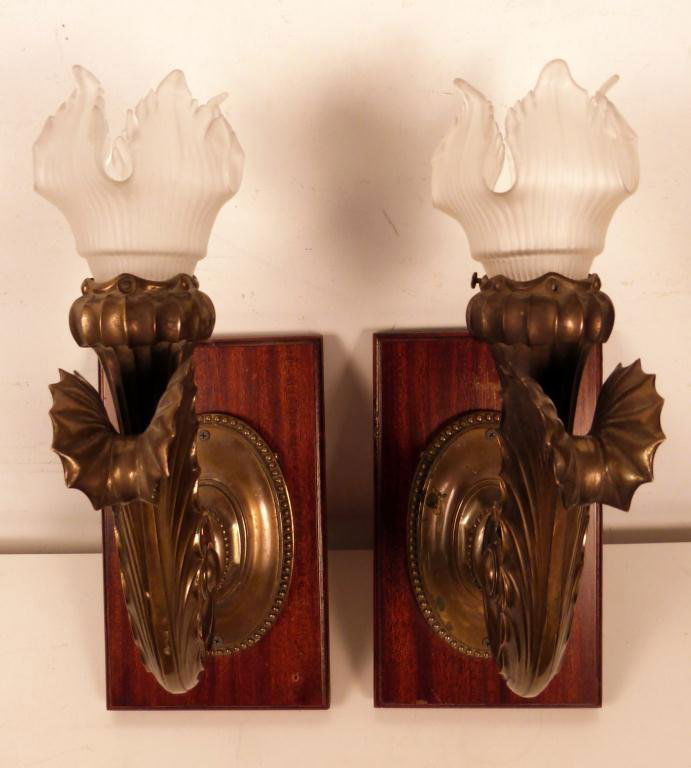Pair Art Nouveau Bronze Wall Sconces: Frosted shades. circa 1900. One shade broken. 16H x 13"D"