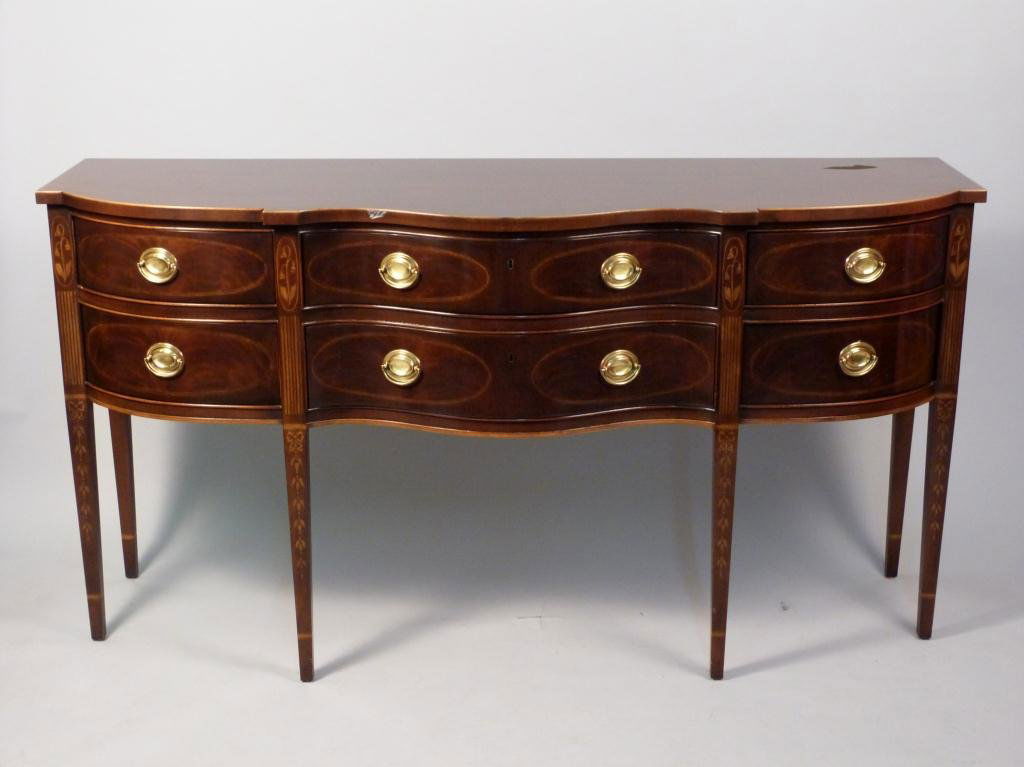 Hepplewhite Style Serpentine Front Side Board: Bellflower and line inlays, burn on right of top. 72L x 24"D x 38"H"
