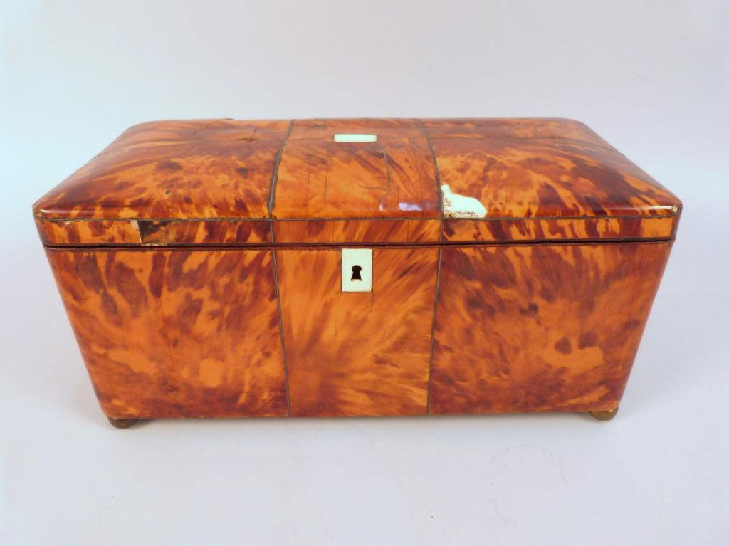 Antique English Tortoise Shell Tea Caddy: Interior Coers, Ivory Trim. Bottle Missing from Front. Rectantangular form, with loses to veneer.