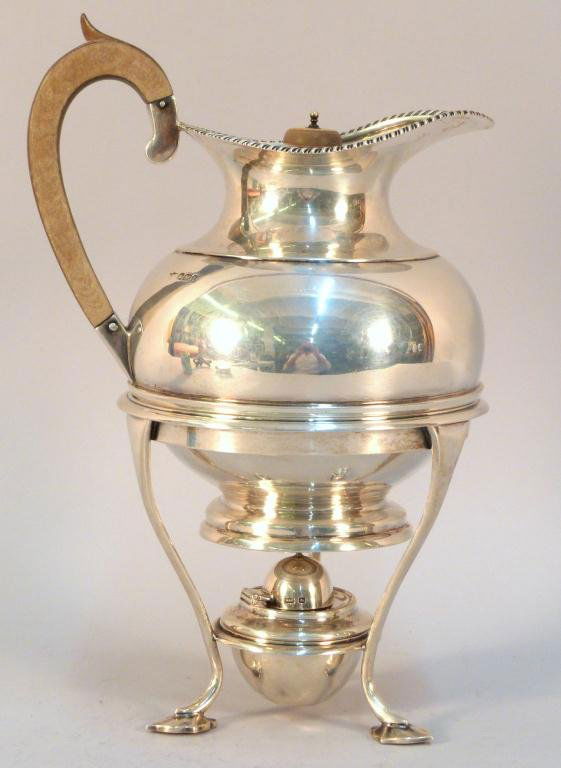 Mappin & Webb English Silver Teapot on Stand: Wood Handle, lilipad feet, All pieces hallmarked. 35.3 troy oz