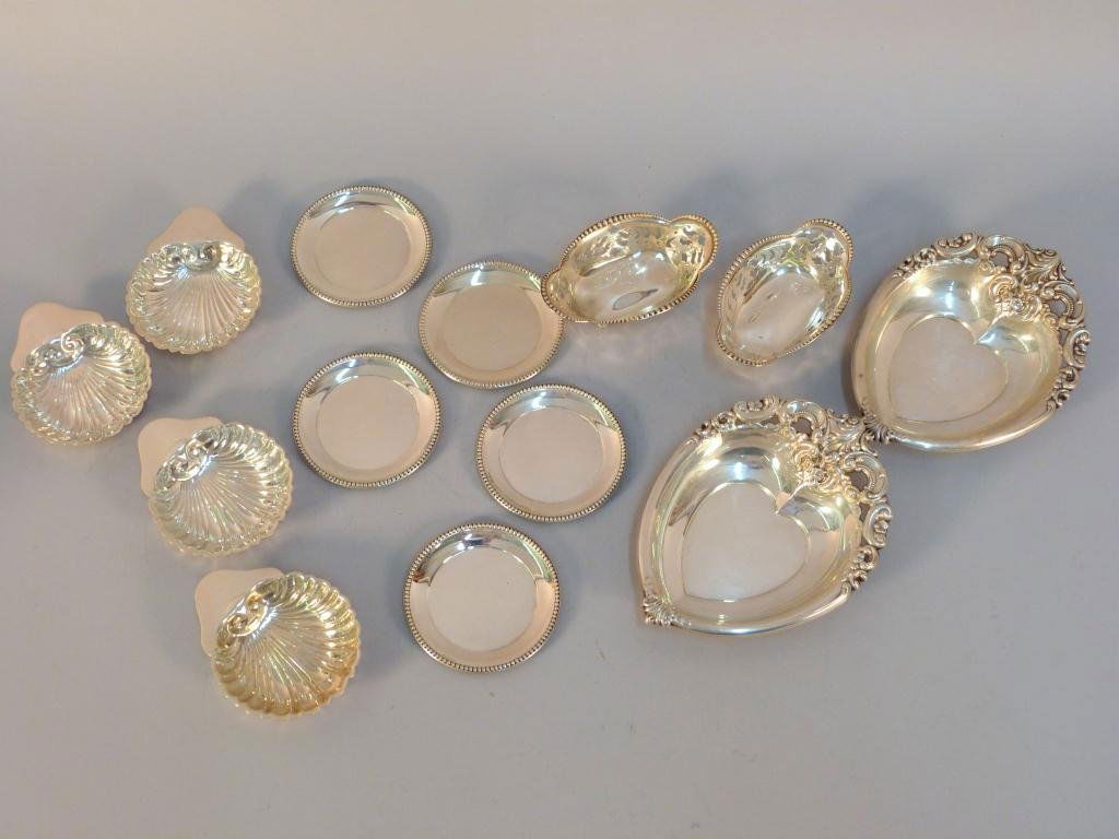 13 Assorted Sterling Nut Dishes: Including Pair of Wallace Grand Baroque. And Pair of TIffany Open Salts. 16.65 troy oz