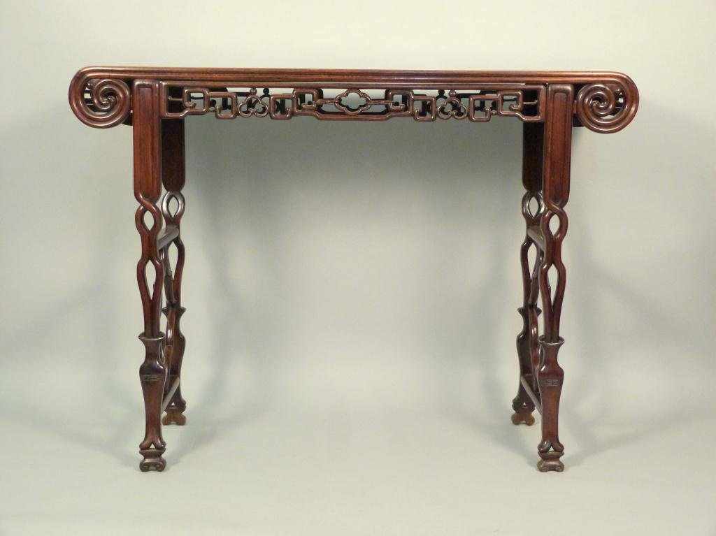 Chinese Carved Rosewood Altar Table: Scroll painting style, all round open carvings with incised designs. 53W X 17"D X 40"H"