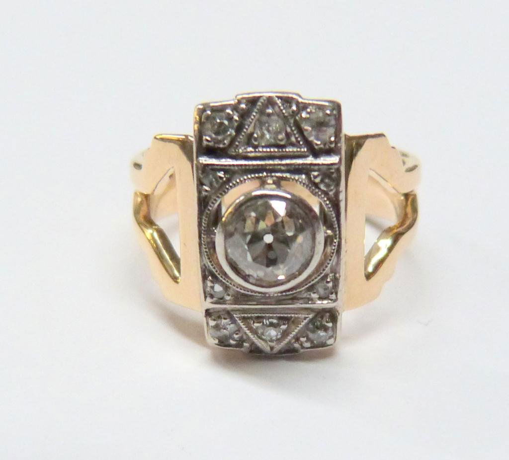Vintage Unmarked Gold and Diamond Ring: Approx. 1/2 CT of Diamonds. Mounted in a gold ring (perhaps from an earlier mount)