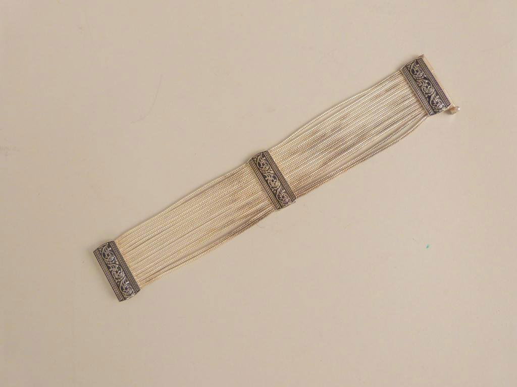 Sterling Silver Bracelet: Liquid Silver Style. 7 1/2 L x 1 1/4"W 1.6 Troy Oz."