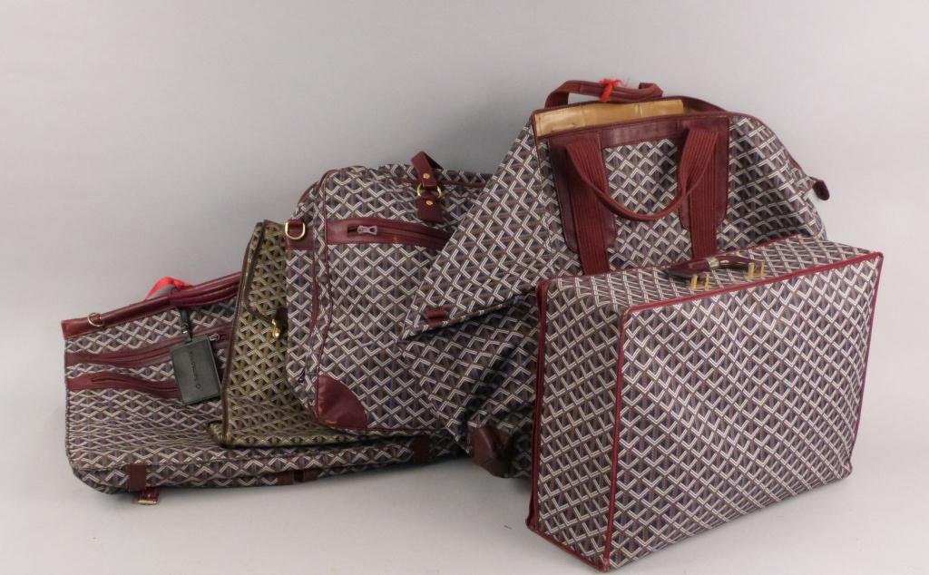 5 Pieces Goyard Style Luggage: Leather Straps. One piece off color. Very good condition.