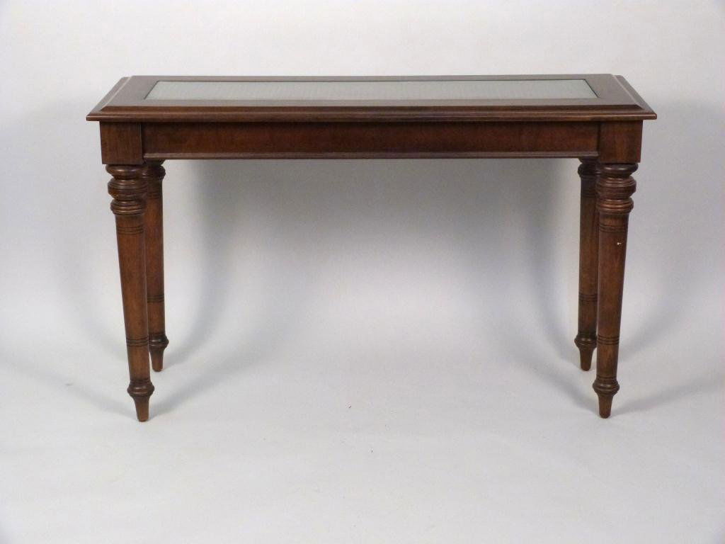 English Mahogany Console: Inset glass and caned top, 48 " W X 17" D X 29 1/2" H. From 258 Riverside Drive.