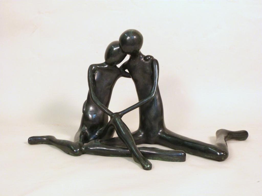Carol Miller (b.1933) - Bronze Sculpture: Couple sitting and embracing. Signed. 33 1/2 W X 17" D X 17" H"