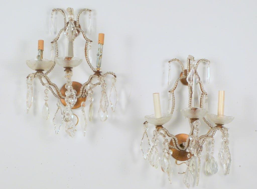 Pair of French 2 Light Sconces: Crystal prisms and beads. center spear finials. As is. 2 extra bobeches. 13 W X 9" D X 18"H."