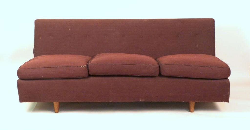 Jens Risom Design Armless Settee: 3 seat cushions and tufted back. Walnut legs. As is upholstery. 69 L X 2" W X 27 1/2" H"
