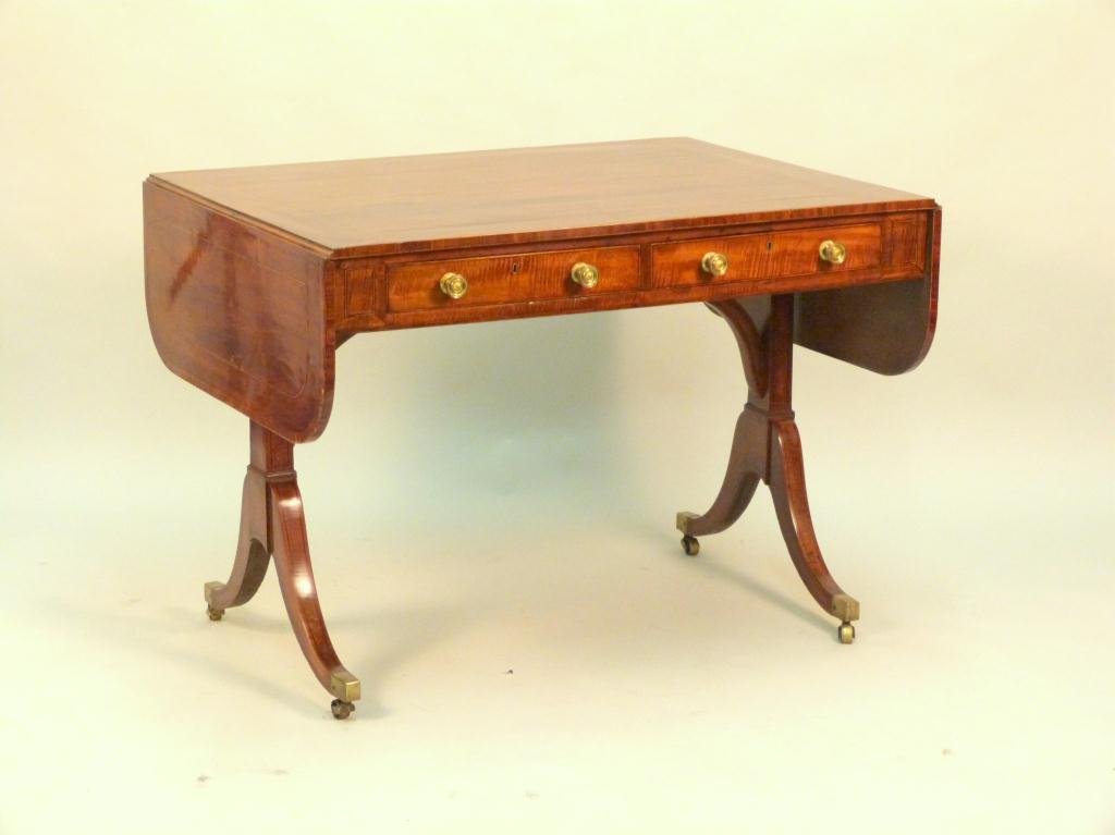 Antique English Sofa Table: Line inlaid top and drawer fronts. Cross banded. Full length drawers. Brass mounted and casters. Finished back. 41 W X 30" D X 29" H, 11 1/2" leaves. (Estate of Peter Jennings)"