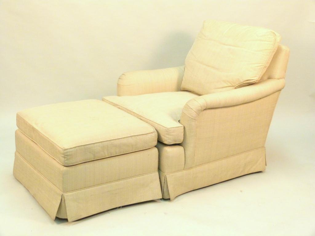 Baker Club Chair and Ottoman: Down back cushion. Stained. Chair 34 W X 41" D X 32" H, ottoman 28" W X 23" D X 17" H. (Estate of Peter Jennings)"