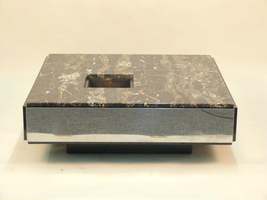 Modern Chrome Base Planter Cocktail Table: Marble top with planter cut out. Chrome and ebonized base. 43 1/2 Sq. X 14" H. (Estate of Peter Jennings)"
