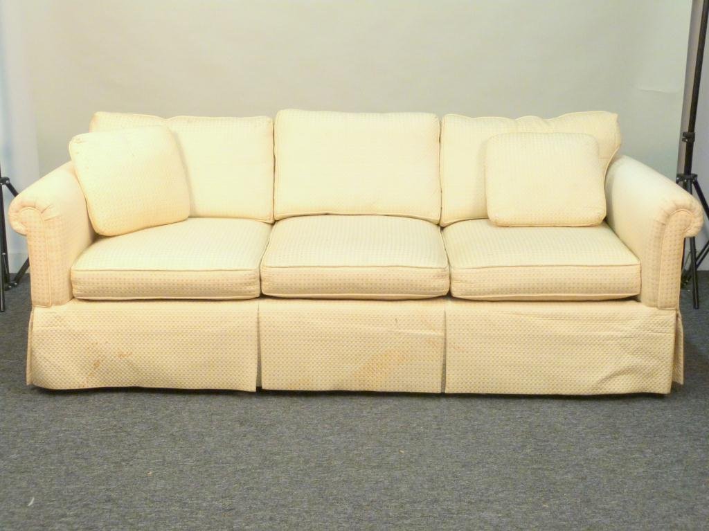 Baker Upholstered Sofa: Pad cushions. Stained. 86 W X 35" D X 32" H to cushion. (Estate of Peter Jennings)"