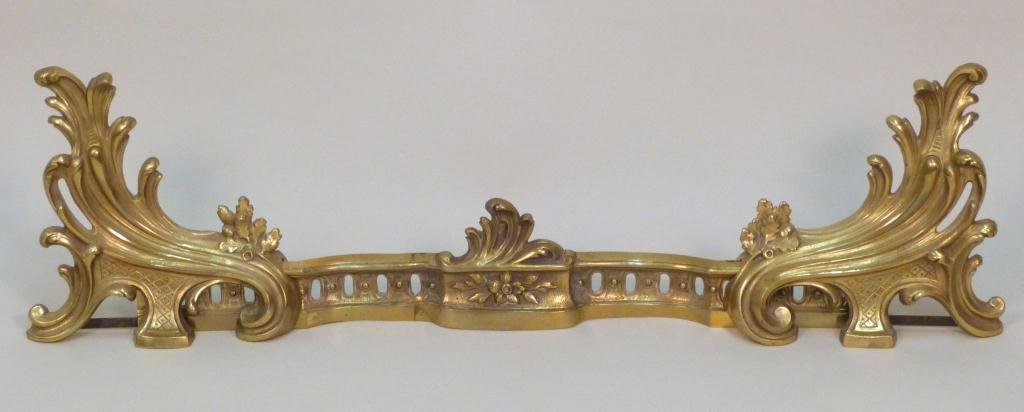 French Gilt Metal Fire Fender: Rococo style, adjustable width. 10 H. (A Park Avenue residence)"