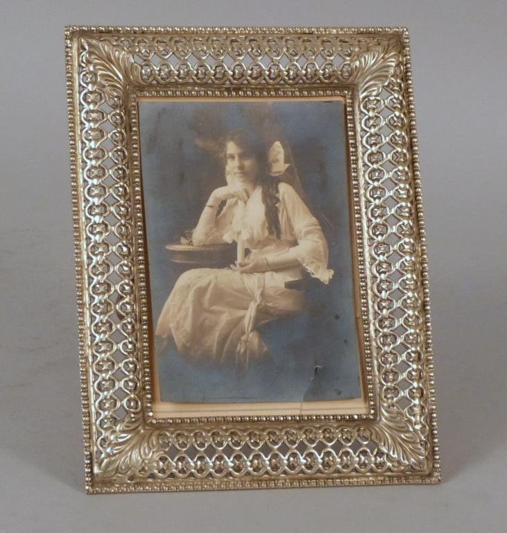 Sterling Silver Easel Picture Frame: Open work design, 9 W x 7" T, 10 troy oz."