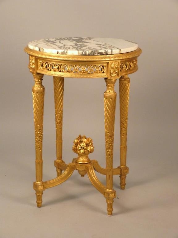 Louis XV Style Lamp Table: Inset marble top, gilt carved, urn floral stretcher, 21 D x 30" H."
