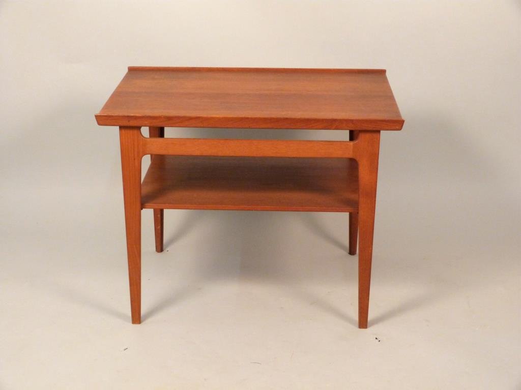 Finn Juhl Danish Modern Coffee Table: Two tier, manufactured by France and Sons, retailed by John Stuart, 28 W x 20" D x 21 1/2" H."