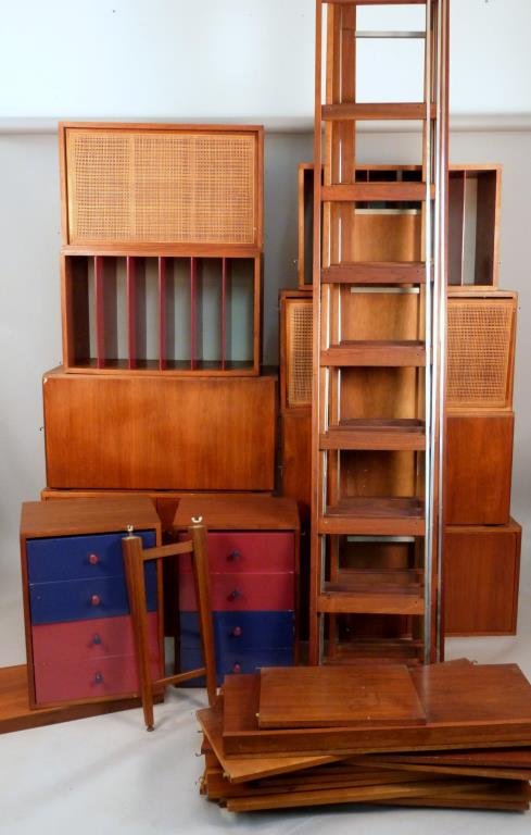 Poul Cadovius Style Danish Modern Wall Unit: Teak, with te modular cabinet units, two with rattan covers, two with red record dividers, two with doors and inner shelves, two fold down units, two units with bue and red shelves, nine upright, and 