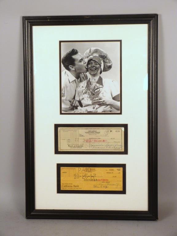 Lucille Ball and Desi Arnaz Collectable: Photo of Lucy an Desi from TV Show. 2 Cancelled checks; from their joint account signed Lucille Ball Arnaz and from his personal acount signed Desi Arnaz. 26 X 17" total"