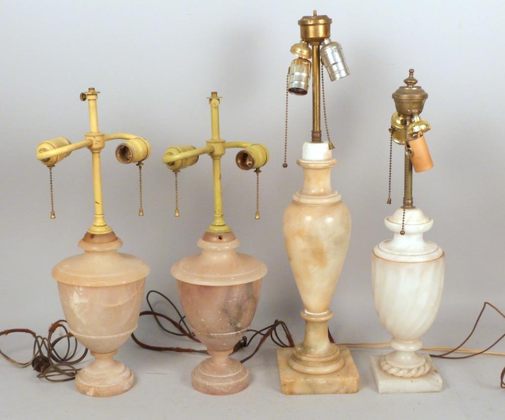 Four Alabaster / Marble Table Lamps: Pink hued pair, together with two singles, tallest 24. As is condition."