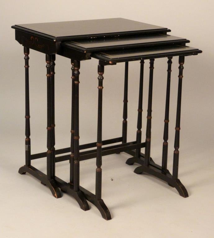 Nest of Three Sheraton Style Ebonized Tables: With gold painted details, 23 W x 15 1/4" D x 27 1/4" H."